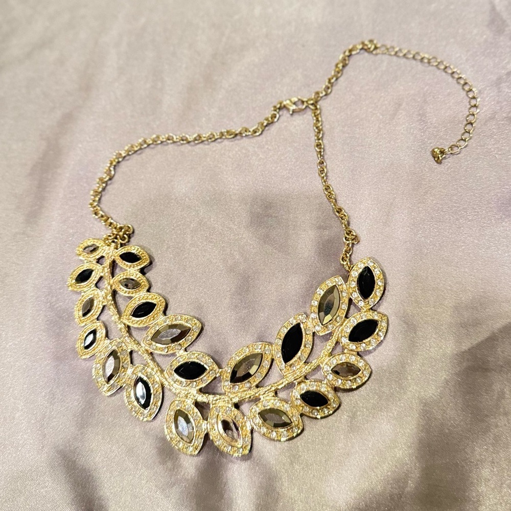 Gold and Black Statement Necklace with Intricate Design
